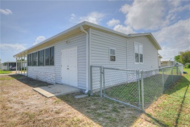 Looks like a Model Beautiful 2018 Jacobsen on highly desired on Barefoot Bay Golf Course in Florida - for sale on GolfHomes.com, golf home, golf lot