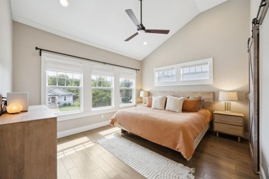 Welcome to this light-filled craftsman-style home with a pool on Stevens Park Golf Course in Texas - for sale on GolfHomes.com, golf home, golf lot