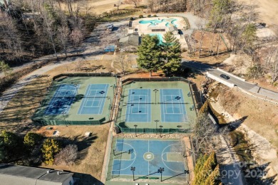 Private, LAKEFRONT LOT on beautiful Lake Lure! Located in on Rumbling Bald Resort on Lake Lure in North Carolina - for sale on GolfHomes.com, golf home, golf lot