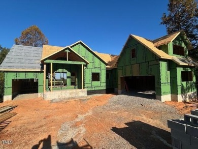 Introducing a luxurious dwelling nestled in the heart of the on Chapel Ridge Golf Club in North Carolina - for sale on GolfHomes.com, golf home, golf lot