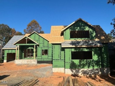 Introducing a luxurious dwelling nestled in the heart of the on Chapel Ridge Golf Club in North Carolina - for sale on GolfHomes.com, golf home, golf lot