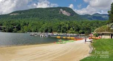 Private, LAKEFRONT LOT on beautiful Lake Lure! Located in on Rumbling Bald Resort on Lake Lure in North Carolina - for sale on GolfHomes.com, golf home, golf lot