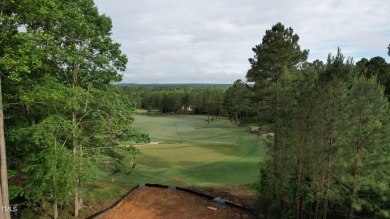 Introducing a luxurious dwelling nestled in the heart of the on Chapel Ridge Golf Club in North Carolina - for sale on GolfHomes.com, golf home, golf lot