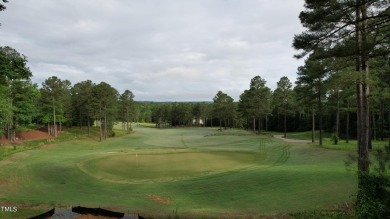 Introducing a luxurious dwelling nestled in the heart of the on Chapel Ridge Golf Club in North Carolina - for sale on GolfHomes.com, golf home, golf lot