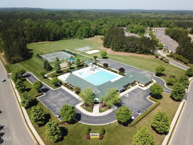 Introducing a luxurious dwelling nestled in the heart of the on Chapel Ridge Golf Club in North Carolina - for sale on GolfHomes.com, golf home, golf lot