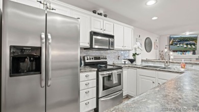 This 3BR/2BA condo truly has it all! Just 8 steps down to your on The Club At Old Kinderhook in Missouri - for sale on GolfHomes.com, golf home, golf lot