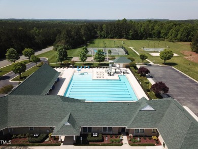 Introducing a luxurious dwelling nestled in the heart of the on Chapel Ridge Golf Club in North Carolina - for sale on GolfHomes.com, golf home, golf lot