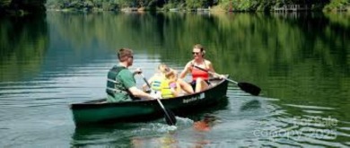 Private, LAKEFRONT LOT on beautiful Lake Lure! Located in on Rumbling Bald Resort on Lake Lure in North Carolina - for sale on GolfHomes.com, golf home, golf lot