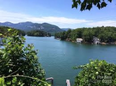 Private, LAKEFRONT LOT on beautiful Lake Lure! Located in on Rumbling Bald Resort on Lake Lure in North Carolina - for sale on GolfHomes.com, golf home, golf lot