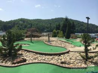 Private, LAKEFRONT LOT on beautiful Lake Lure! Located in on Rumbling Bald Resort on Lake Lure in North Carolina - for sale on GolfHomes.com, golf home, golf lot