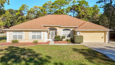 Welcome to this beautifully updated 4-bedroom, 3-bath home on Sugarmill Woods Golf and Country Club in Florida - for sale on GolfHomes.com, golf home, golf lot