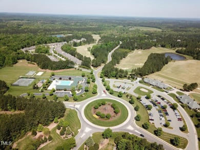 Introducing a luxurious dwelling nestled in the heart of the on Chapel Ridge Golf Club in North Carolina - for sale on GolfHomes.com, golf home, golf lot