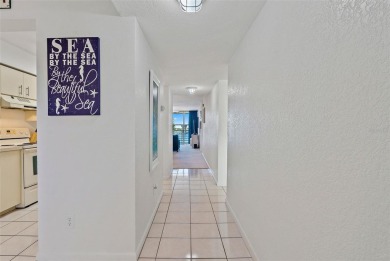 Under contract-accepting backup offers. WATER, WATER EVERYWHERE! on Isla Del Sol Yacht and Country Club in Florida - for sale on GolfHomes.com, golf home, golf lot