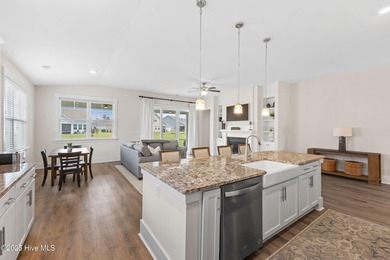 Located in the sought-after Heron Pointe neighborhood of on Cape Fear National At Brunswick Forest in North Carolina - for sale on GolfHomes.com, golf home, golf lot