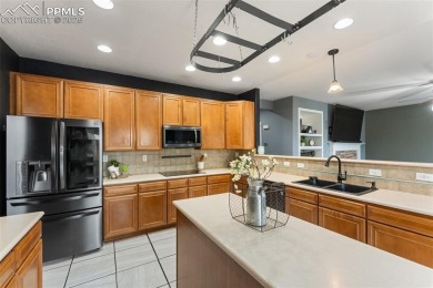 Welcome to your dream home in the highly sought-after Woodmen on Antler Creek Golf Course in Colorado - for sale on GolfHomes.com, golf home, golf lot