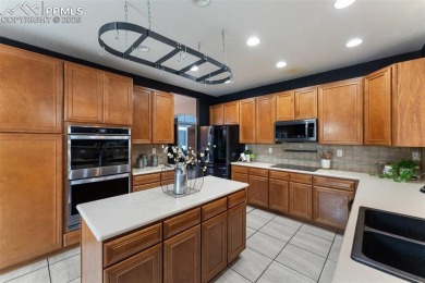 Welcome to your dream home in the highly sought-after Woodmen on Antler Creek Golf Course in Colorado - for sale on GolfHomes.com, golf home, golf lot