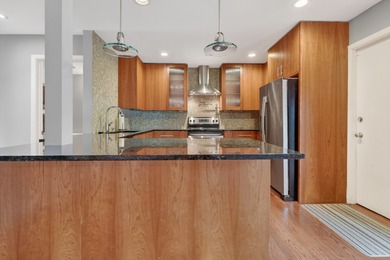 Beautiful townhome with mid century modern touches set on a on Old Orchard Country Club in Illinois - for sale on GolfHomes.com, golf home, golf lot