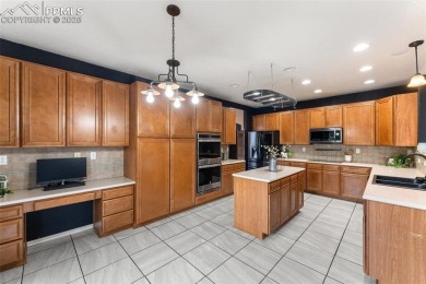 Welcome to your dream home in the highly sought-after Woodmen on Antler Creek Golf Course in Colorado - for sale on GolfHomes.com, golf home, golf lot