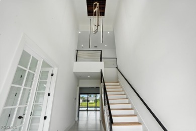 A Modern Masterpiece in Cape Royal Golf Club. Brand-new 2025 on Royal Tee Country Club in Florida - for sale on GolfHomes.com, golf home, golf lot