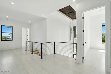 A Modern Masterpiece in Cape Royal Golf Club. Brand-new 2025 on Royal Tee Country Club in Florida - for sale on GolfHomes.com, golf home, golf lot