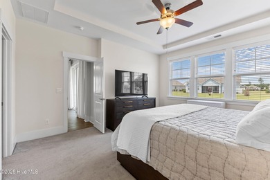 Located in the sought-after Heron Pointe neighborhood of on Cape Fear National At Brunswick Forest in North Carolina - for sale on GolfHomes.com, golf home, golf lot