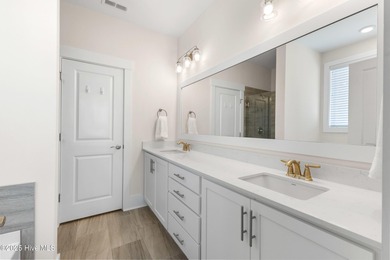 Located in the sought-after Heron Pointe neighborhood of on Cape Fear National At Brunswick Forest in North Carolina - for sale on GolfHomes.com, golf home, golf lot