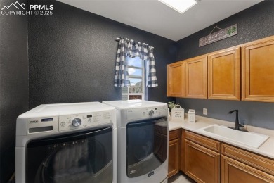 Welcome to your dream home in the highly sought-after Woodmen on Antler Creek Golf Course in Colorado - for sale on GolfHomes.com, golf home, golf lot