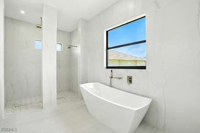 A Modern Masterpiece in Cape Royal Golf Club. Brand-new 2025 on Royal Tee Country Club in Florida - for sale on GolfHomes.com, golf home, golf lot