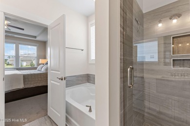 Located in the sought-after Heron Pointe neighborhood of on Cape Fear National At Brunswick Forest in North Carolina - for sale on GolfHomes.com, golf home, golf lot