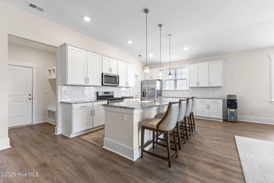 Located in the sought-after Heron Pointe neighborhood of on Cape Fear National At Brunswick Forest in North Carolina - for sale on GolfHomes.com, golf home, golf lot