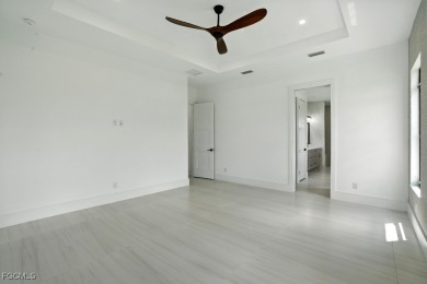 A Modern Masterpiece in Cape Royal Golf Club. Brand-new 2025 on Royal Tee Country Club in Florida - for sale on GolfHomes.com, golf home, golf lot
