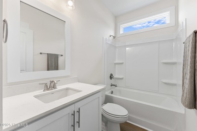 Located in the sought-after Heron Pointe neighborhood of on Cape Fear National At Brunswick Forest in North Carolina - for sale on GolfHomes.com, golf home, golf lot