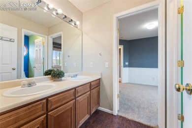 Welcome to your dream home in the highly sought-after Woodmen on Antler Creek Golf Course in Colorado - for sale on GolfHomes.com, golf home, golf lot