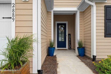 Located in the sought-after Heron Pointe neighborhood of on Cape Fear National At Brunswick Forest in North Carolina - for sale on GolfHomes.com, golf home, golf lot