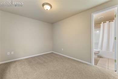 Welcome to your dream home in the highly sought-after Woodmen on Antler Creek Golf Course in Colorado - for sale on GolfHomes.com, golf home, golf lot