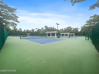 Located in the sought-after Heron Pointe neighborhood of on Cape Fear National At Brunswick Forest in North Carolina - for sale on GolfHomes.com, golf home, golf lot