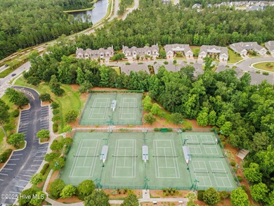 Located in the sought-after Heron Pointe neighborhood of on Cape Fear National At Brunswick Forest in North Carolina - for sale on GolfHomes.com, golf home, golf lot