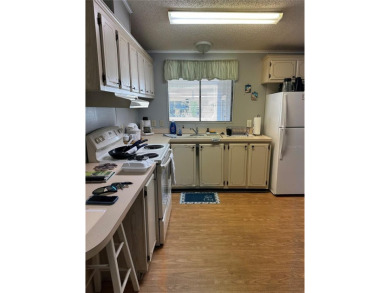 55+ gated golf course community   *PRICE REDUCED* 2 bedroom 2 on Zellwood Station Country Club in Florida - for sale on GolfHomes.com, golf home, golf lot