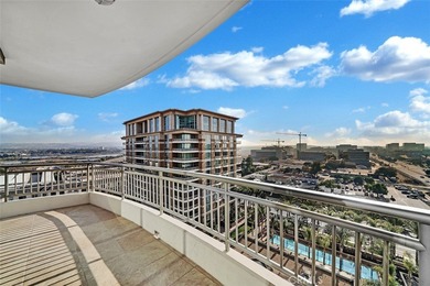 luxurious single-level penthouse-style home located on the 12th on Rancho San Joaquin Golf Course in California - for sale on GolfHomes.com, golf home, golf lot