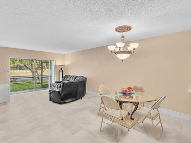 This 2 bedroom, 2 bath condo is perfectly situated on the first on Colony West Country Club in Florida - for sale on GolfHomes.com, golf home, golf lot