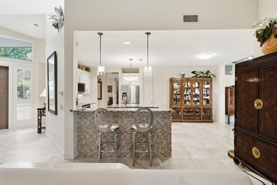 Spacious and updated, this 3-bedroom, 3-bath + office home on Mariner Sands Country Club in Florida - for sale on GolfHomes.com, golf home, golf lot