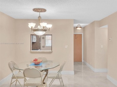 This 2 bedroom, 2 bath condo is perfectly situated on the first on Colony West Country Club in Florida - for sale on GolfHomes.com, golf home, golf lot