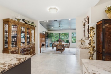 Spacious and updated, this 3-bedroom, 3-bath + office home on Mariner Sands Country Club in Florida - for sale on GolfHomes.com, golf home, golf lot