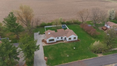 Experience luxurious living in this exquisite brick ranch home on Crestwicke Country Club in Illinois - for sale on GolfHomes.com, golf home, golf lot