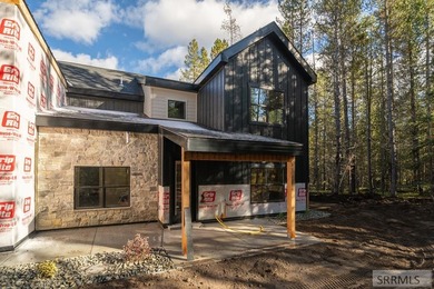 Discover mountain living at its finest in Island Park's first on Island Park Village Resort Golf Course in  - for sale on GolfHomes.com, golf home, golf lot