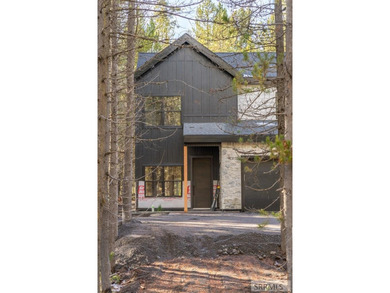 Discover mountain living at its finest in Island Park's first on Island Park Village Resort Golf Course in  - for sale on GolfHomes.com, golf home, golf lot