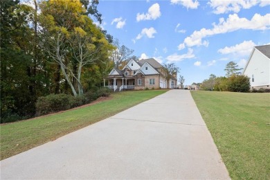 Welcome to your dream home in the highly sought-after Traditions on Traditions of Braselton Golf Club in Georgia - for sale on GolfHomes.com, golf home, golf lot