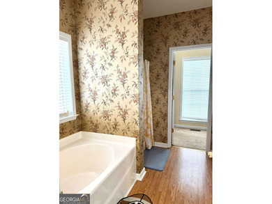 Welcome to this private home tucked in the River North Golf on Canongate At Healy Point Country Club in Georgia - for sale on GolfHomes.com, golf home, golf lot