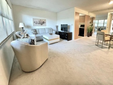 Welcome to Portofino Point in Wynmoor, a vibrant 55+ community on Wynmoor Golf Course in Florida - for sale on GolfHomes.com, golf home, golf lot