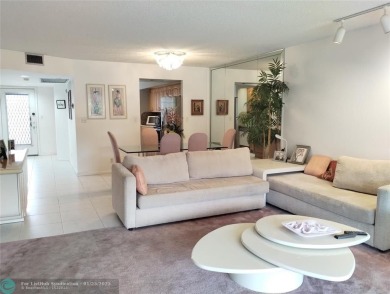 LIVE IN PRESTIGIOUS CAYMAN WAY ON AVENUE OF THE STARS! STEPS TO on Wynmoor Golf Course in Florida - for sale on GolfHomes.com, golf home, golf lot